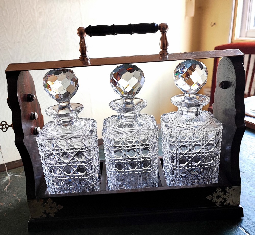 An antique mahogany and cut glass tantalus. View XVI