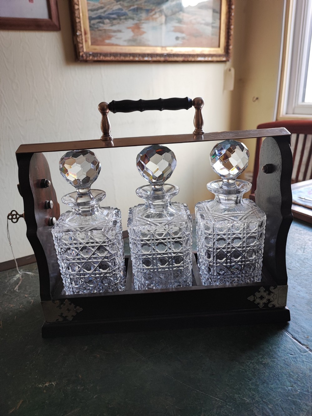 An antique mahogany and cut glass tantalus. View XVII