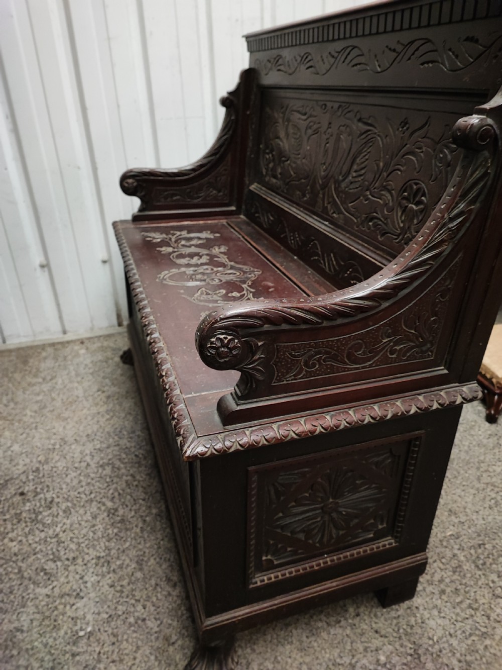 An antique italian carved walnut hall bench or settle View VI