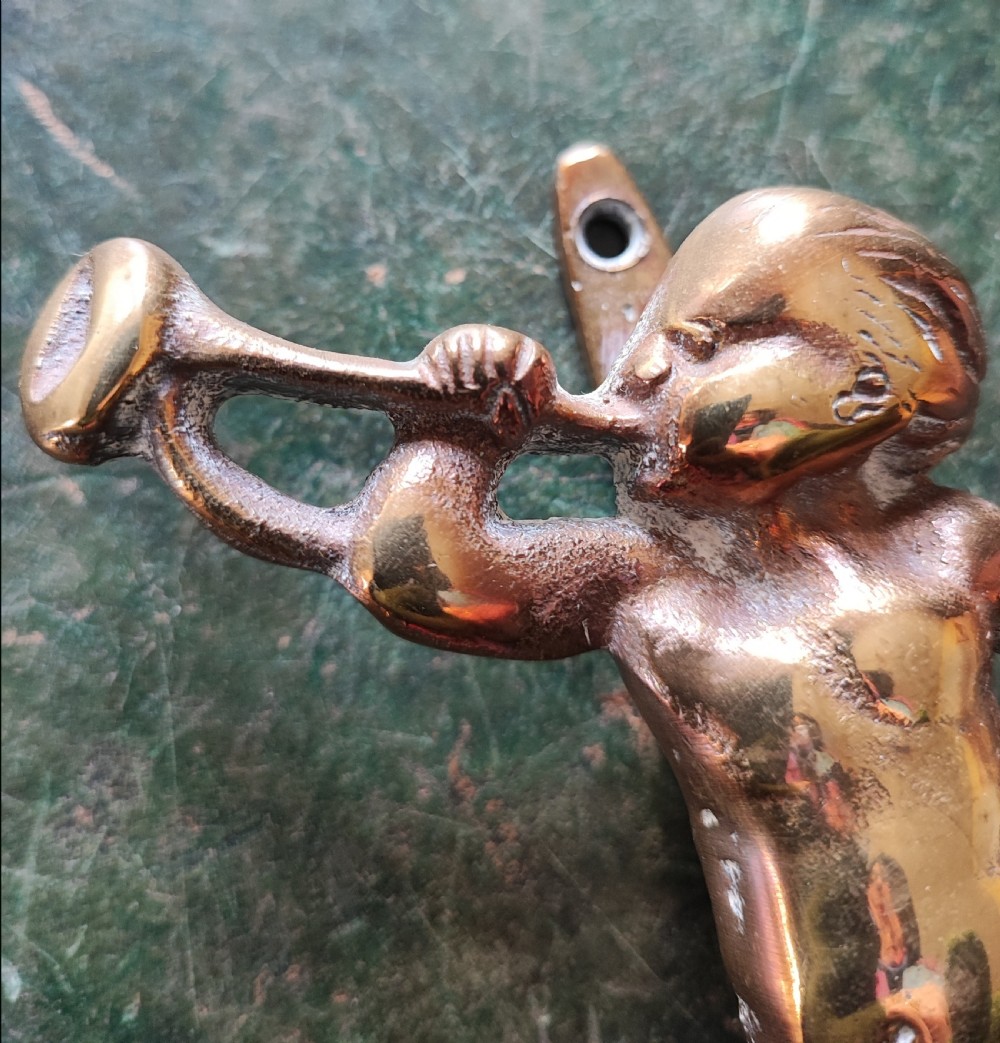 Edwardian cherub brass door knocker. View VII