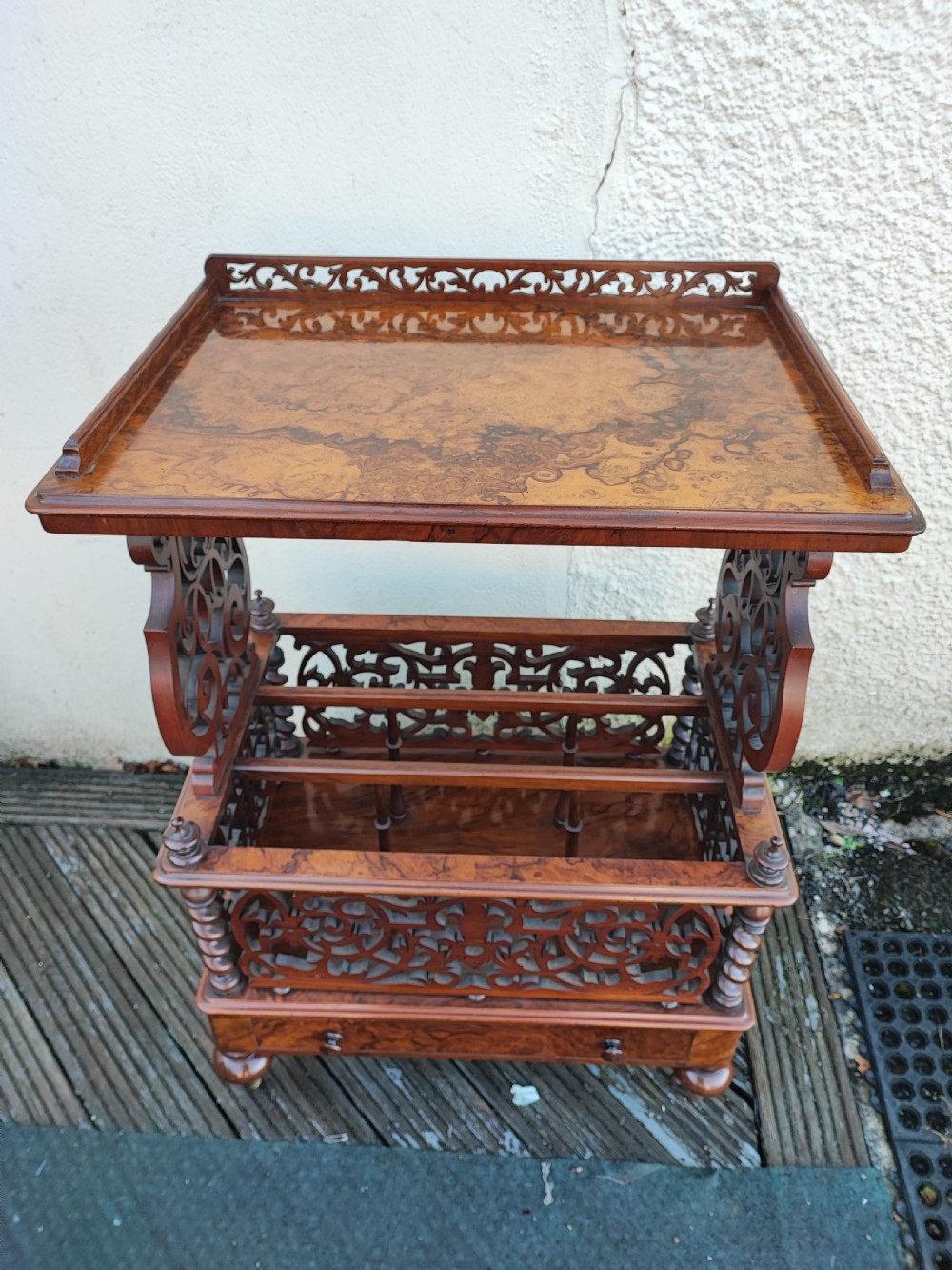 A superb Victorian Canterbury whatnot in burr walnut, 