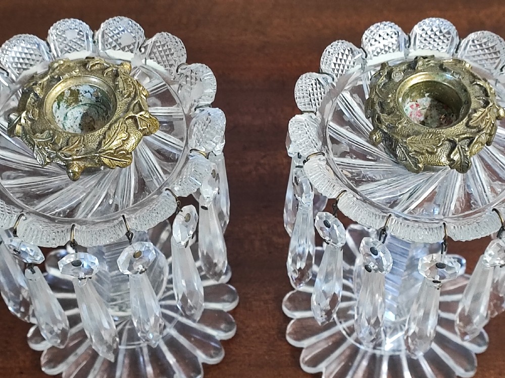 A small pair of Regency cut glass and brass candle lusters View II