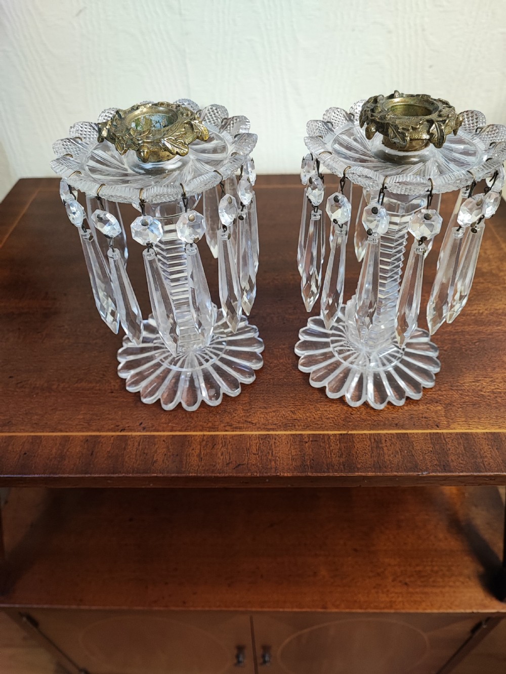 A small pair of Regency cut glass and brass candle lusters View III