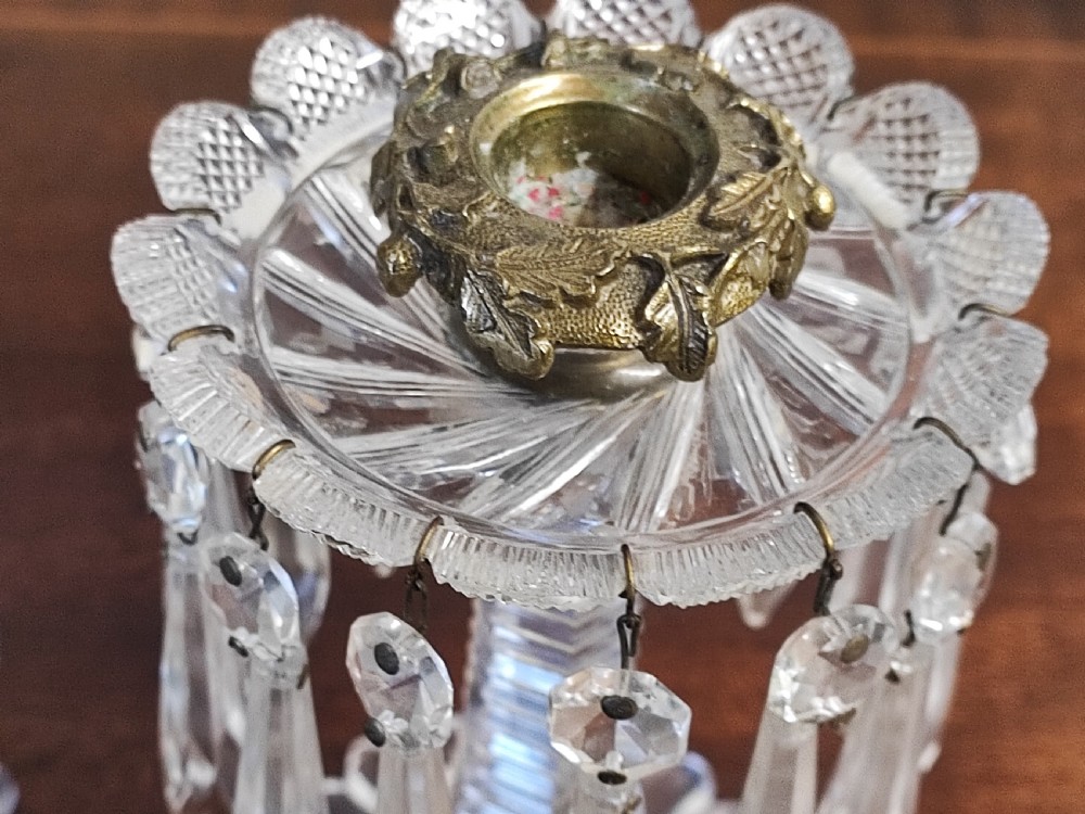 A small pair of Regency cut glass and brass candle lusters View V