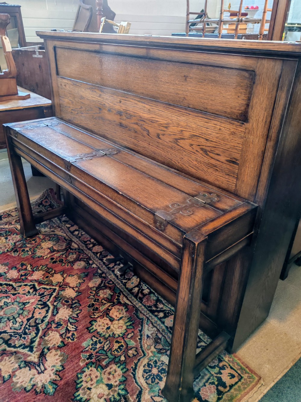 A superb art's and crafts piano,case by Walter Cave , movement by Carl Bechstein.