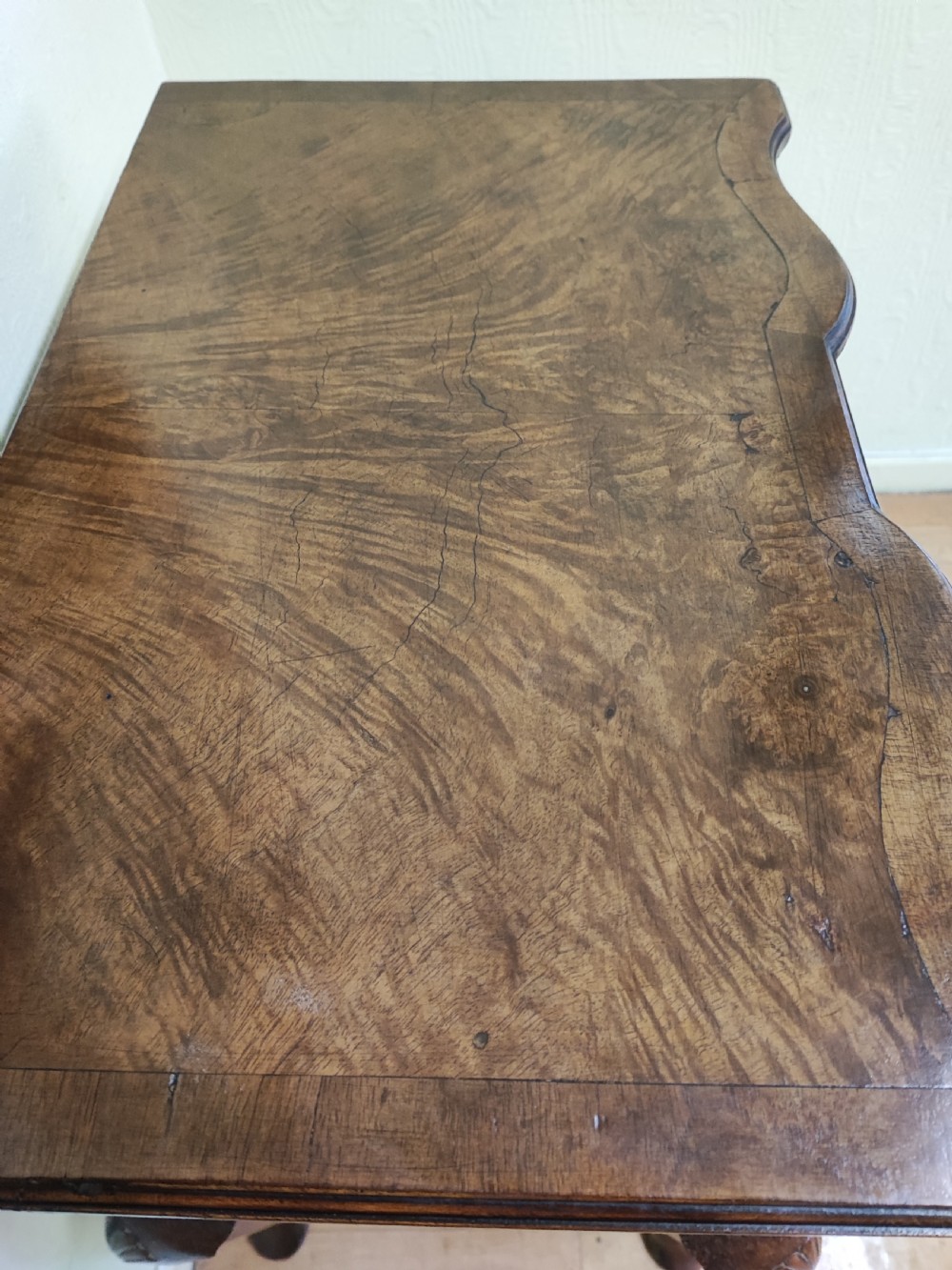 Antique walnut serpentine side table in the Queen Anne style. View III