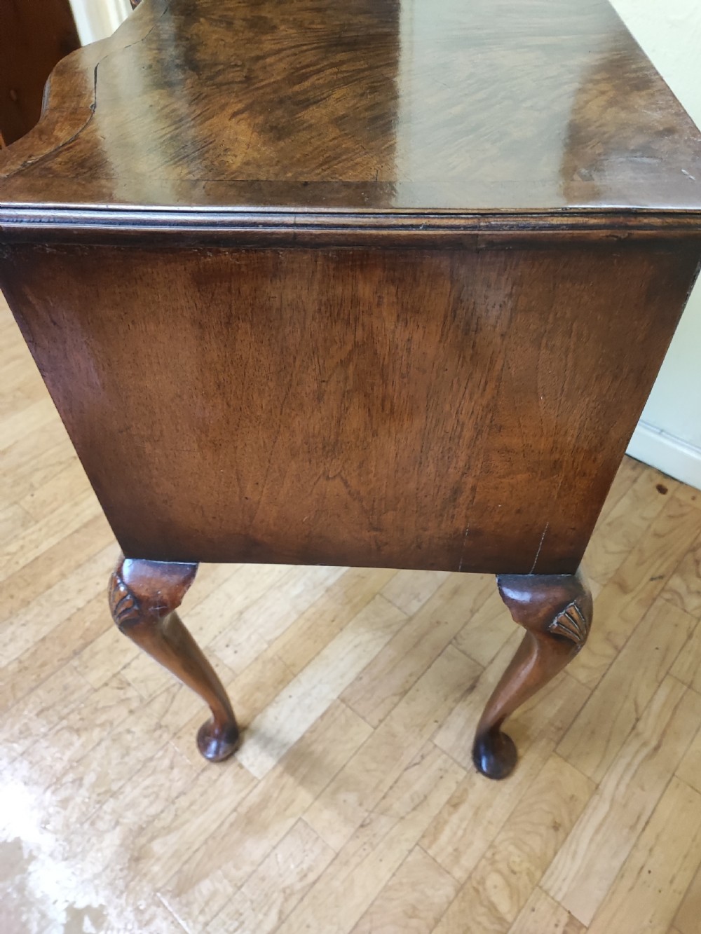 Antique walnut serpentine side table in the Queen Anne style. View VI