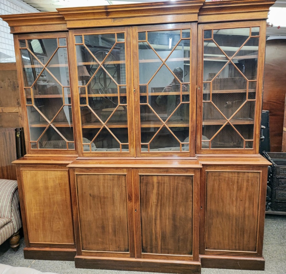 Antique mahogany breakfront bookcase in the George III style. View III