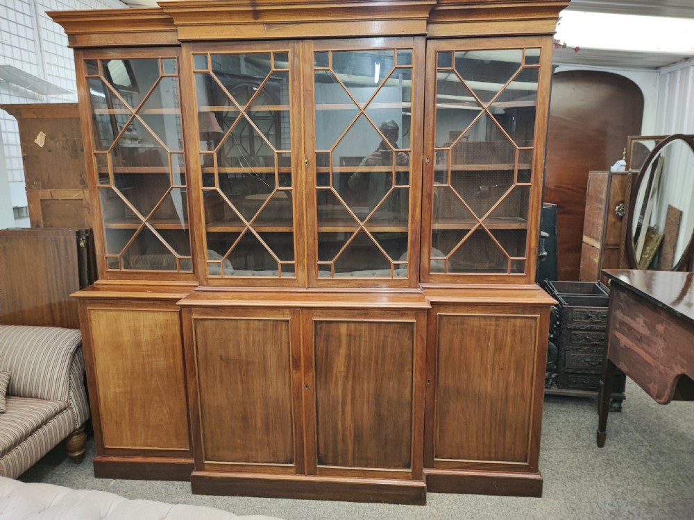 Antique mahogany breakfront bookcase in the George III style. View IV
