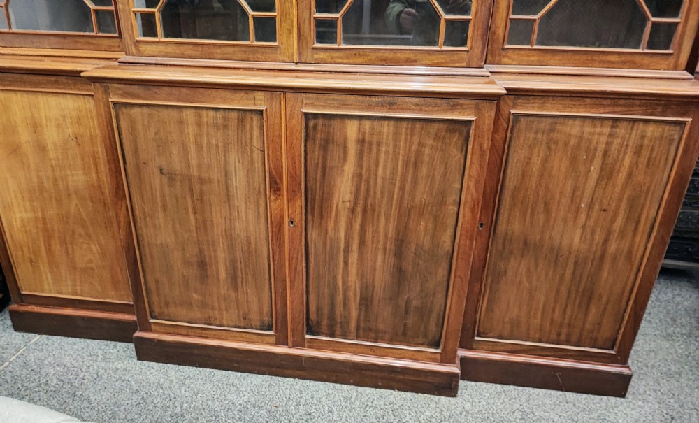 Antique mahogany breakfront bookcase in the George III style. View V