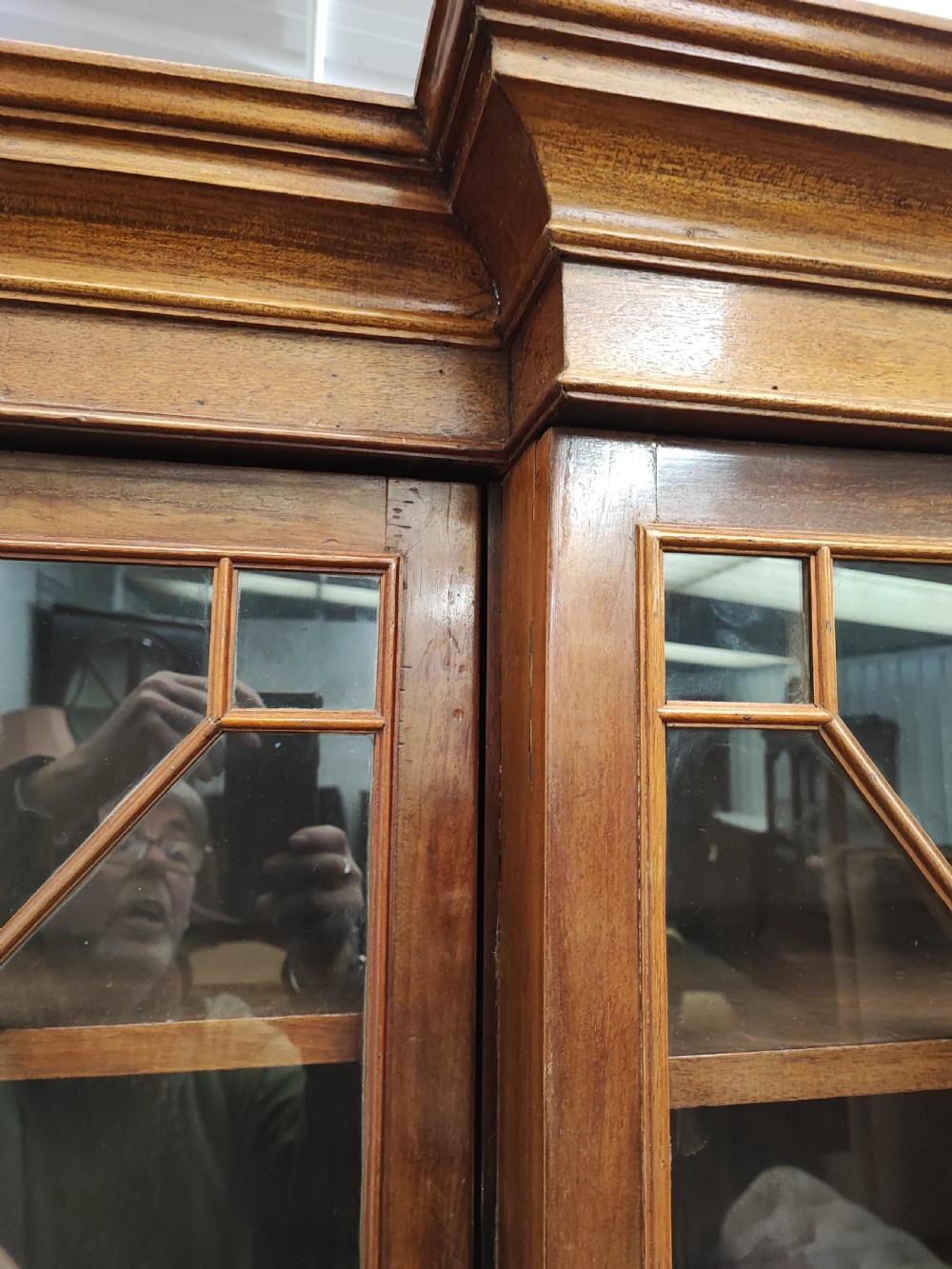 Antique mahogany breakfront bookcase in the George III style. View VII