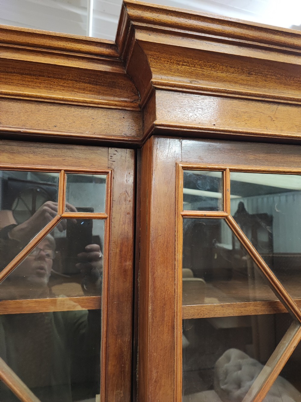 Antique mahogany breakfront bookcase in the George III style. View VIII