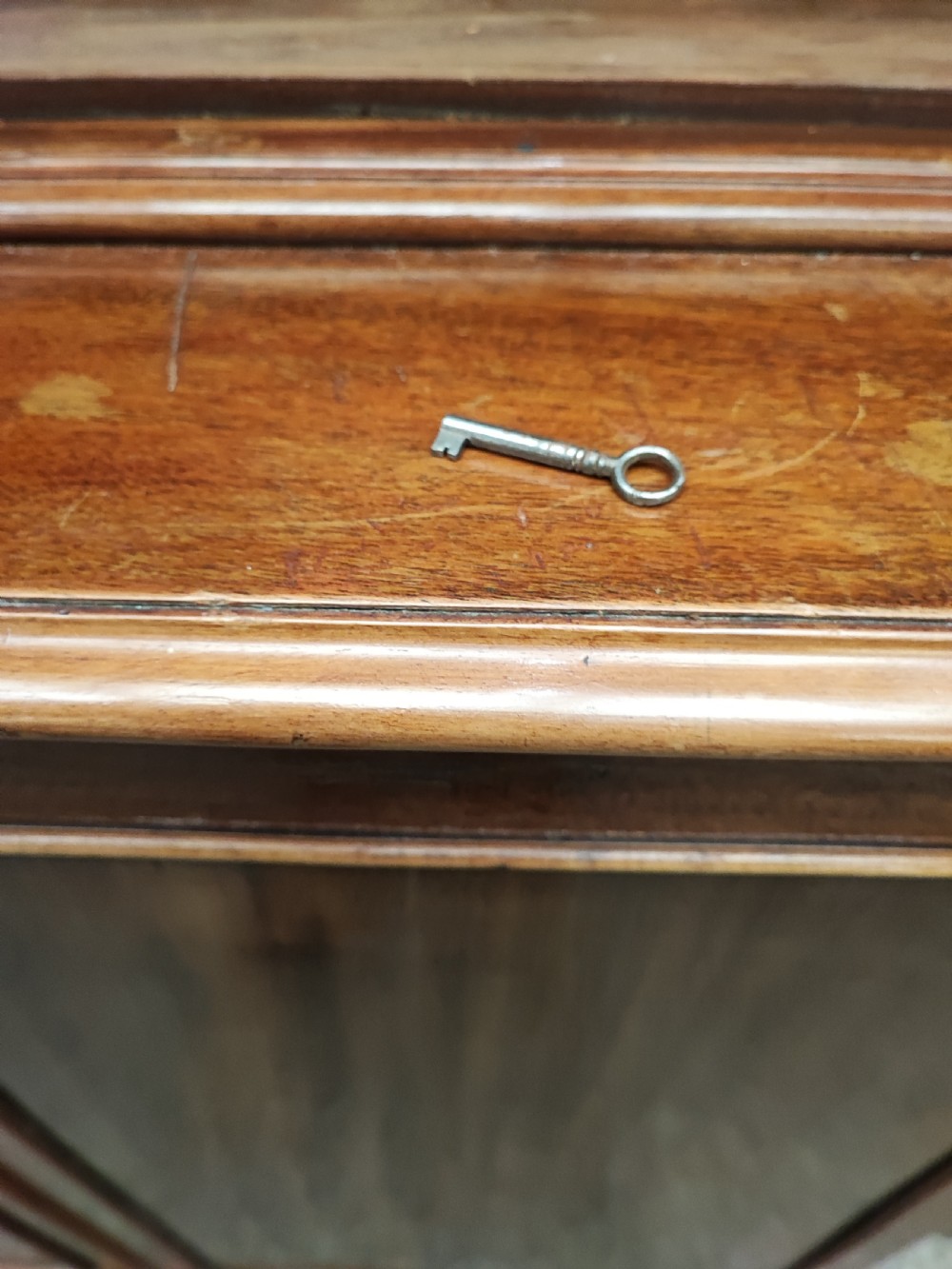 Antique mahogany breakfront bookcase in the George III style. View XI