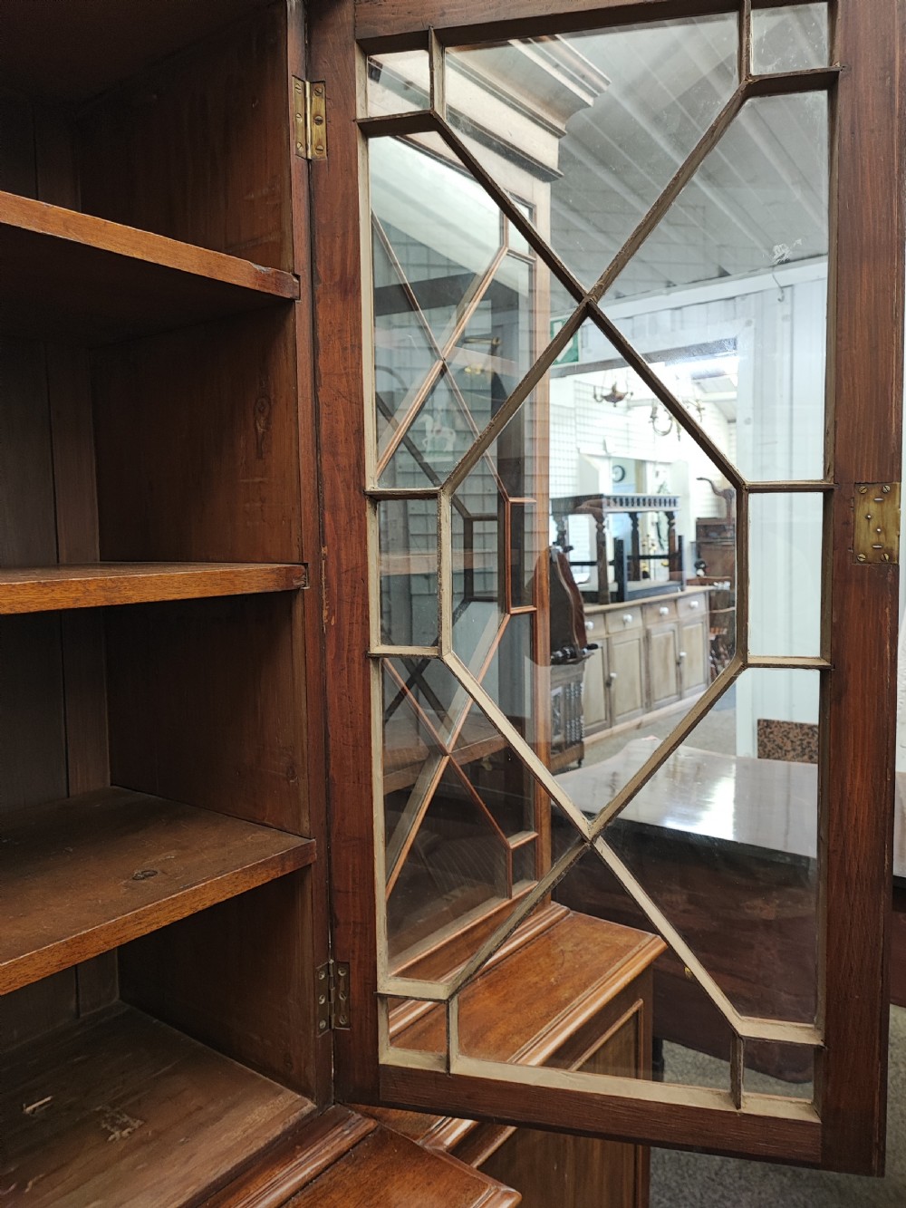 Antique mahogany breakfront bookcase in the George III style. View XV