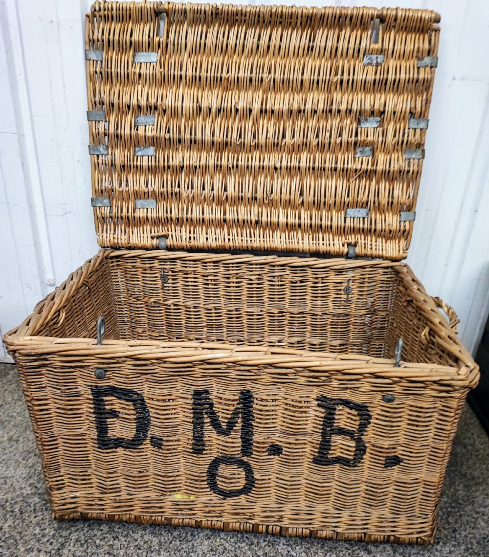Antique willow log or laundry basket,of a large size.