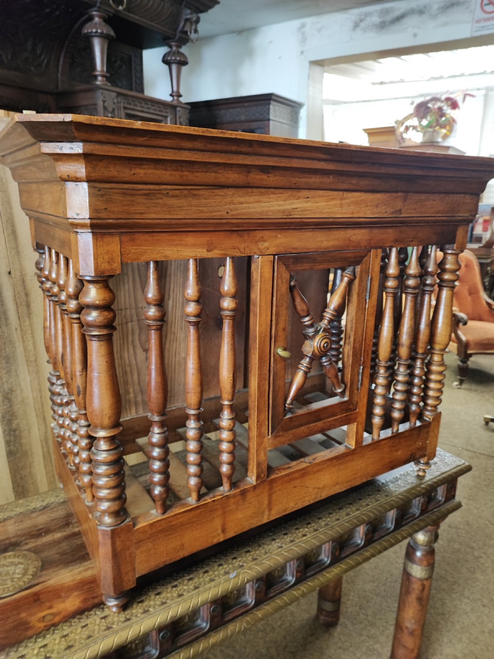 An antique walnut French Panetiere or bread store 