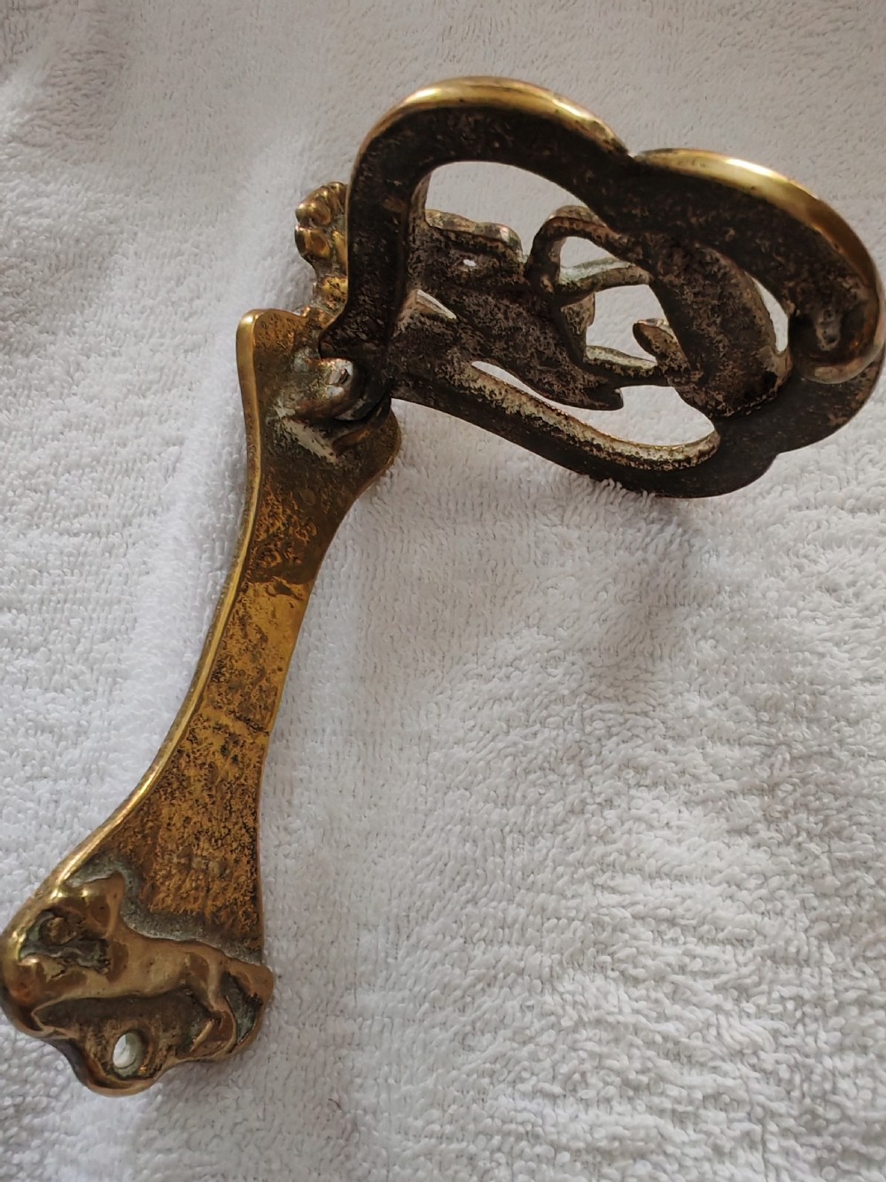 Antique brass door knocker depicting John Peel. View VI
