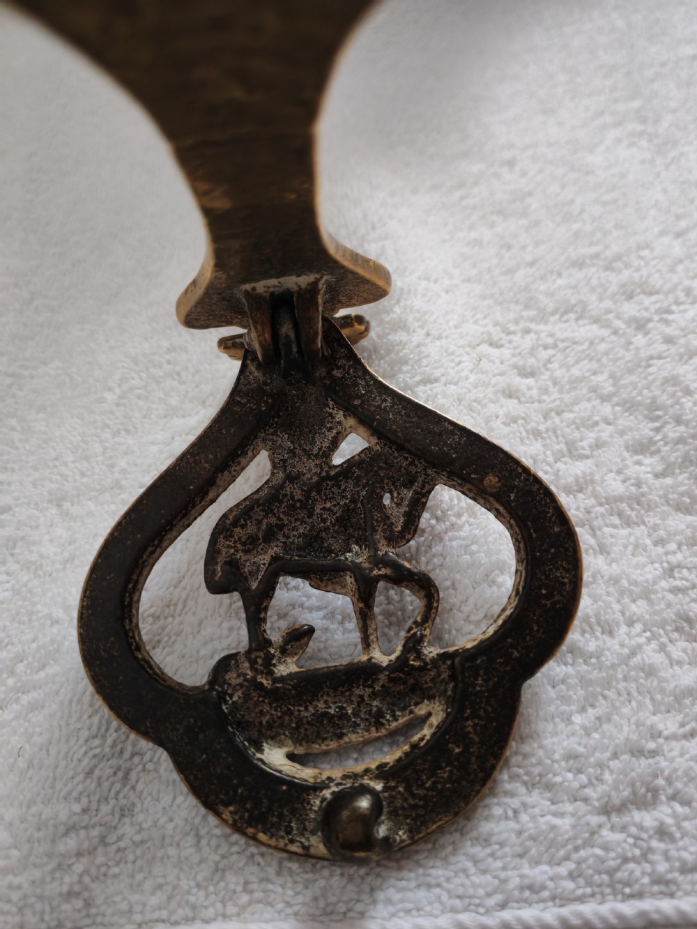 Antique brass door knocker depicting John Peel. View IX