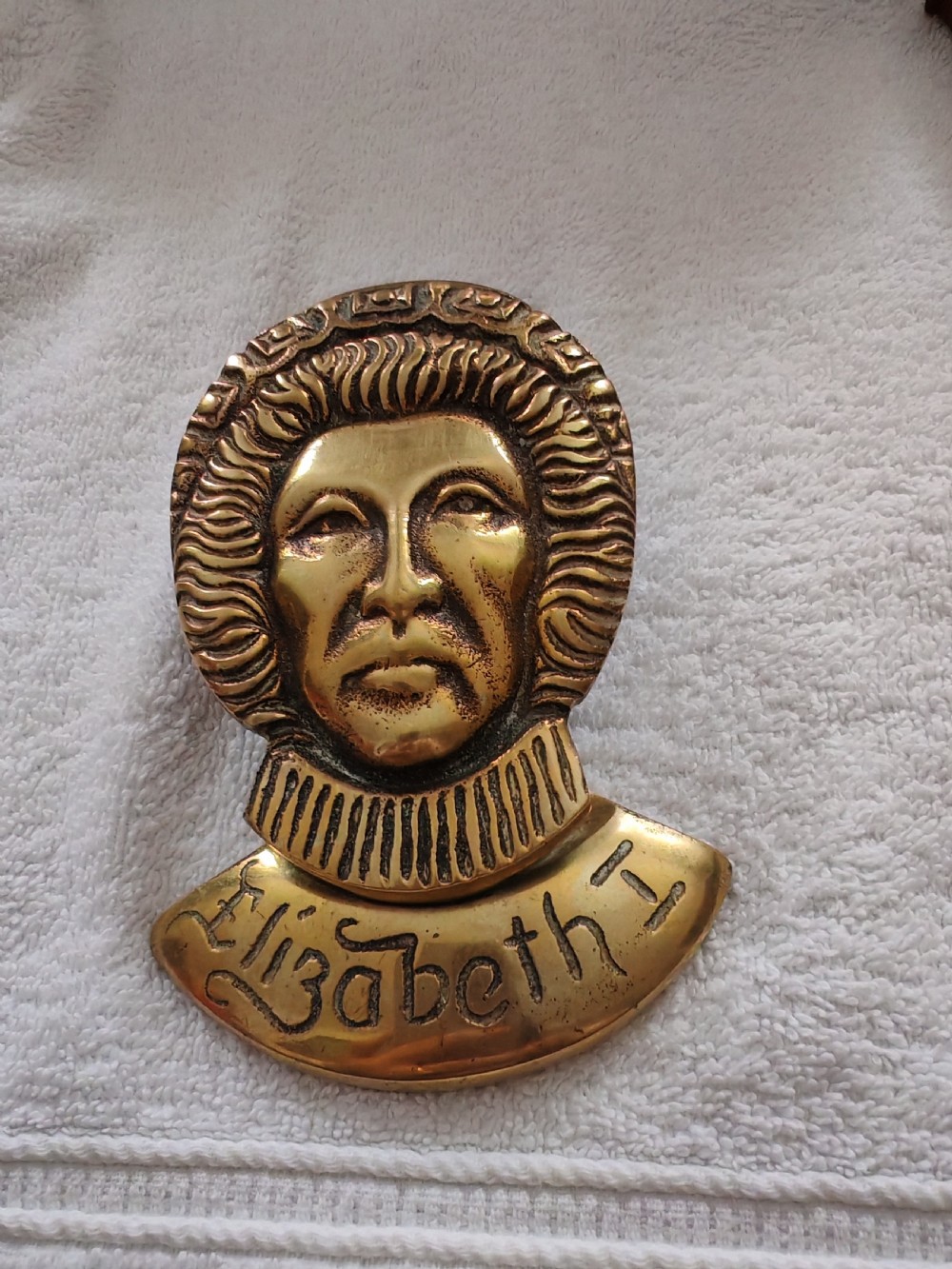 Antique brass door knocker depicting Elizabeth the first. View IV