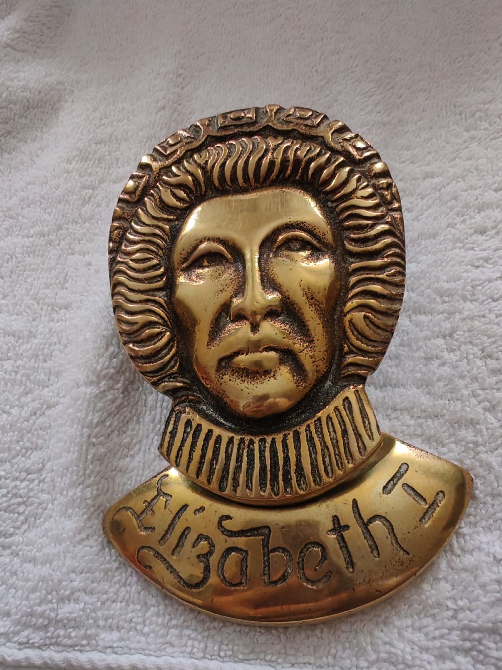 Antique brass door knocker depicting Elizabeth the first. View X