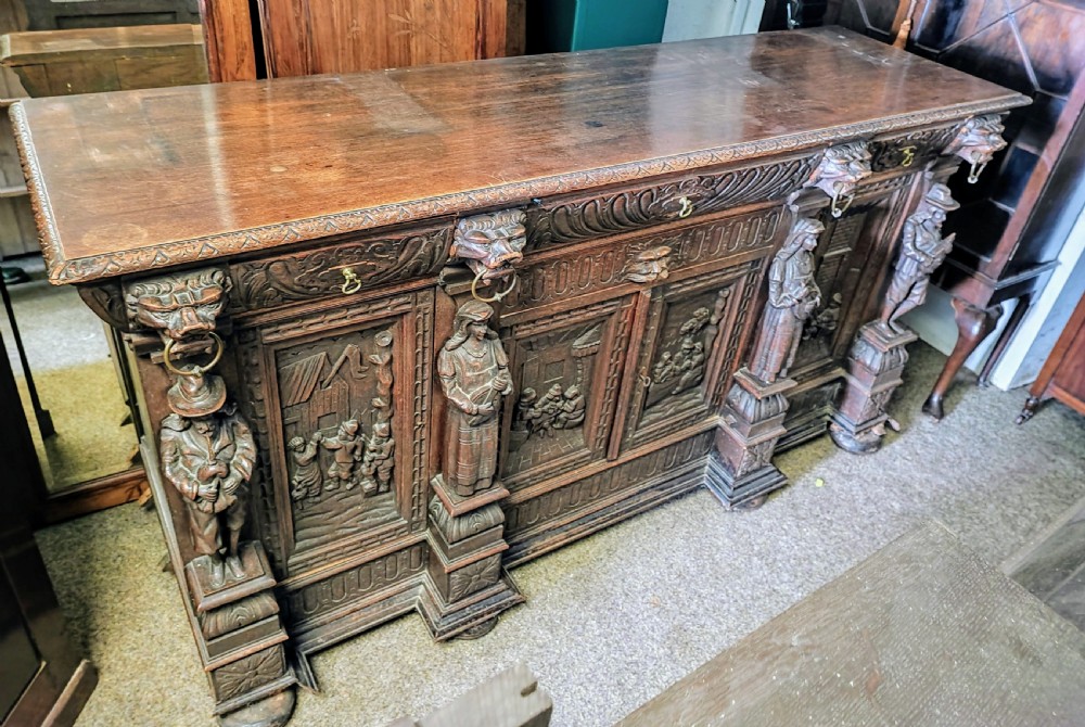 Fabulous carved oak sideboard of large size. View IX