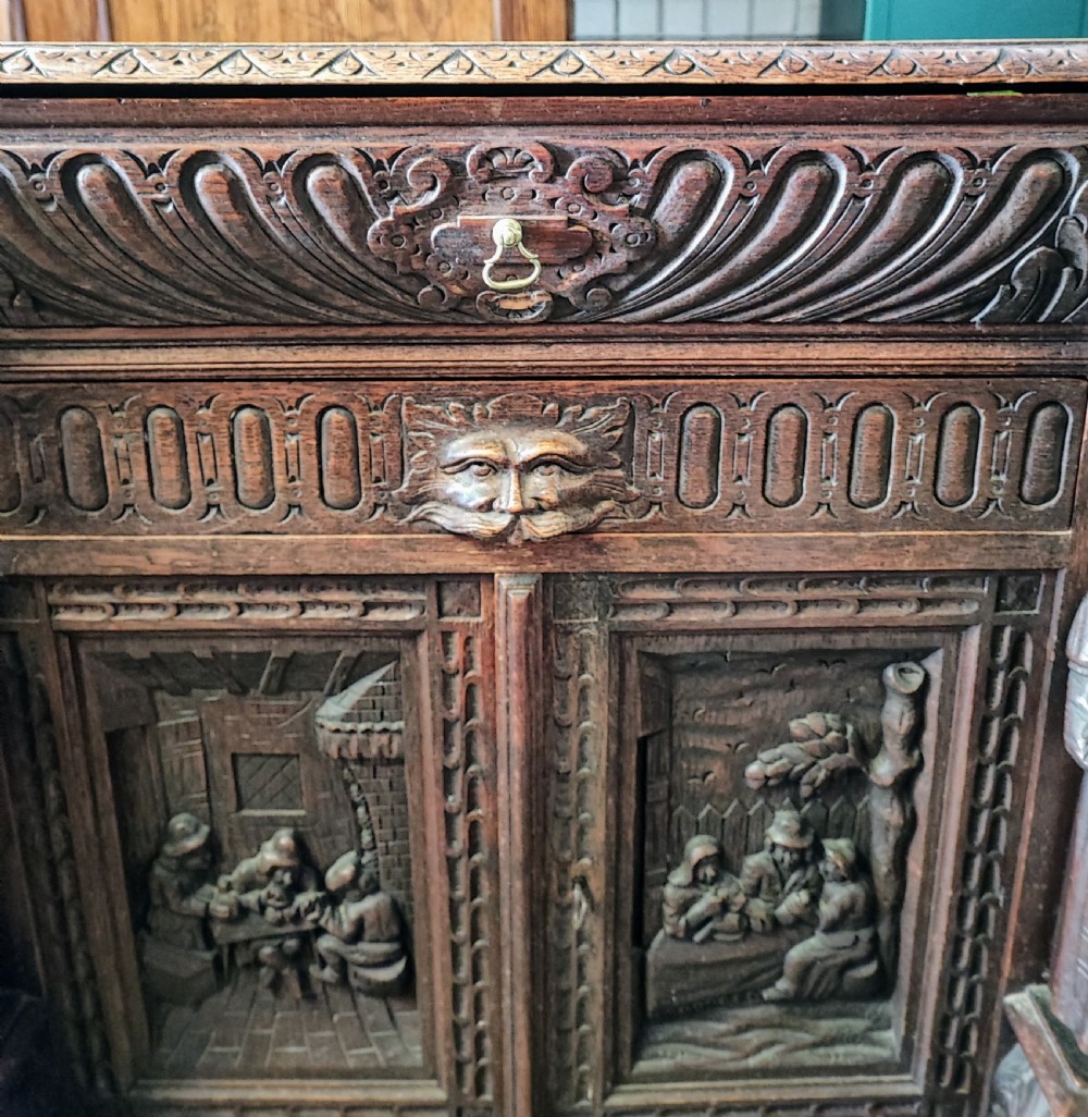 Fabulous carved oak sideboard of large size. View XII