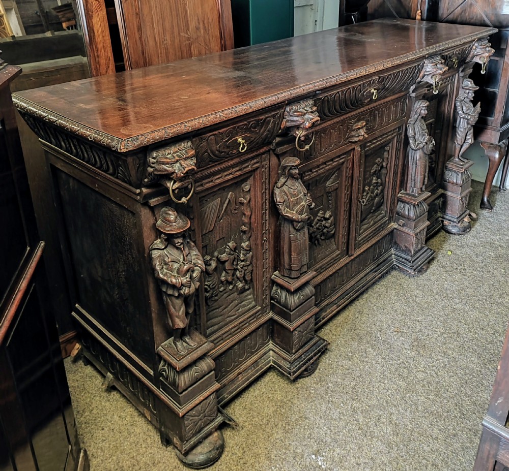 Fabulous carved oak sideboard of large size. View XIII