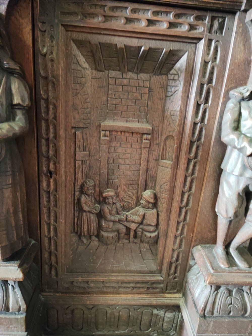 Fabulous carved oak sideboard of large size. View XIV