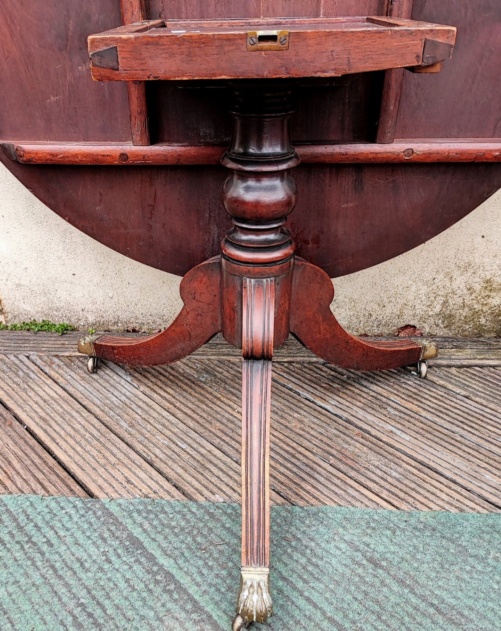 Regency mahogany circular tilt top dining table. View IV