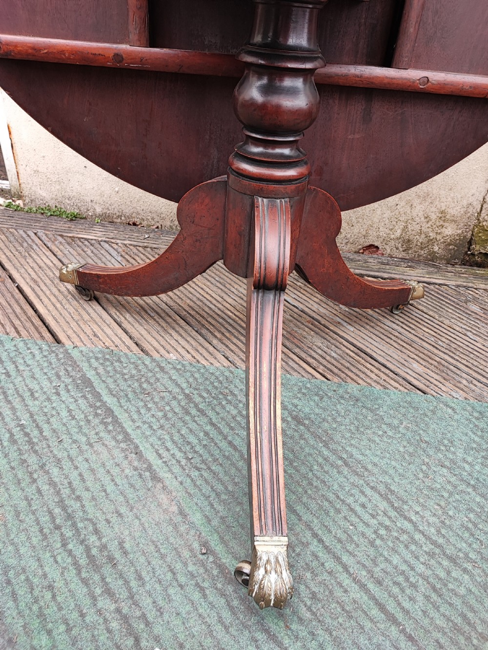 Regency mahogany circular tilt top dining table. View VII