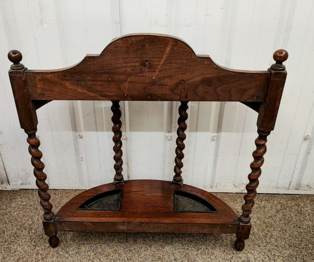 Antique English oak umbrella stick stand. View IV