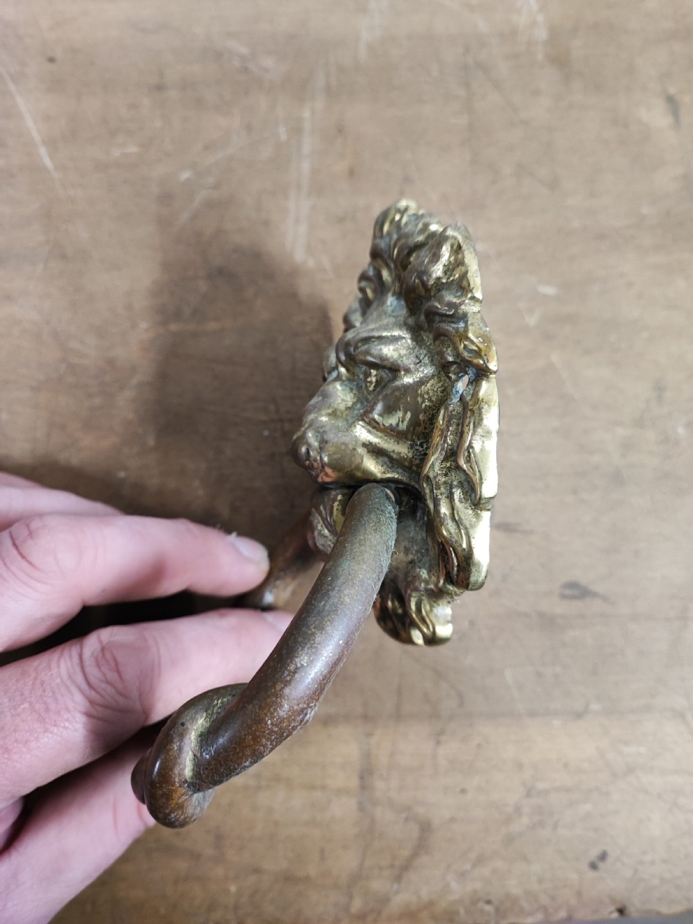 Antique brass lion mask door knocker. View II