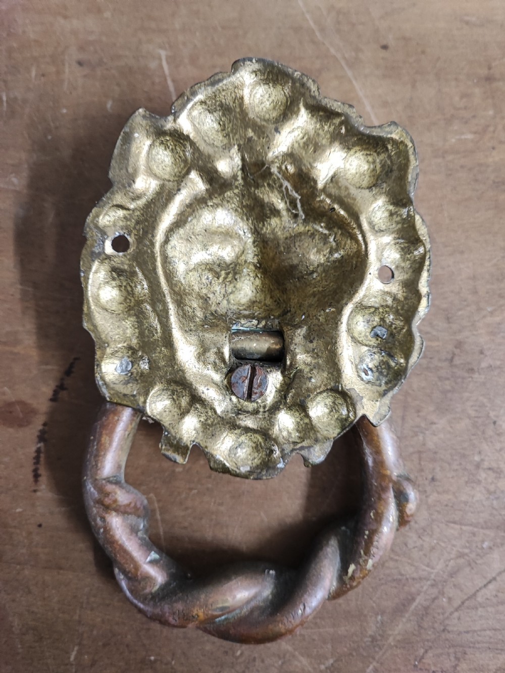 Antique brass lion mask door knocker. View III