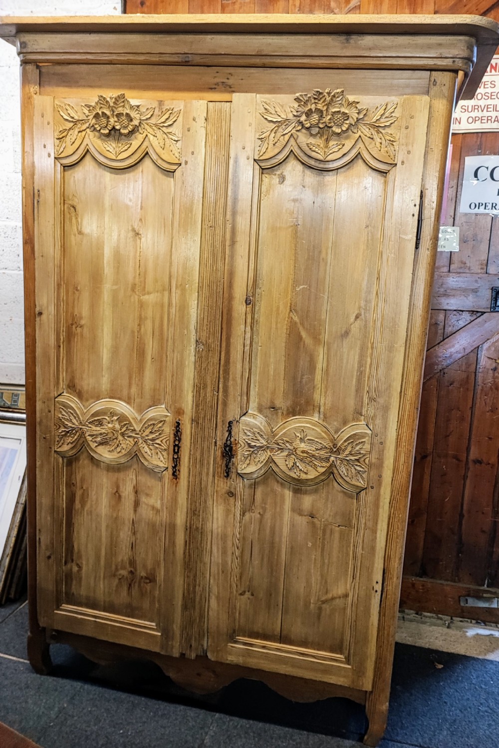 Antique, French pine marriage armoire.