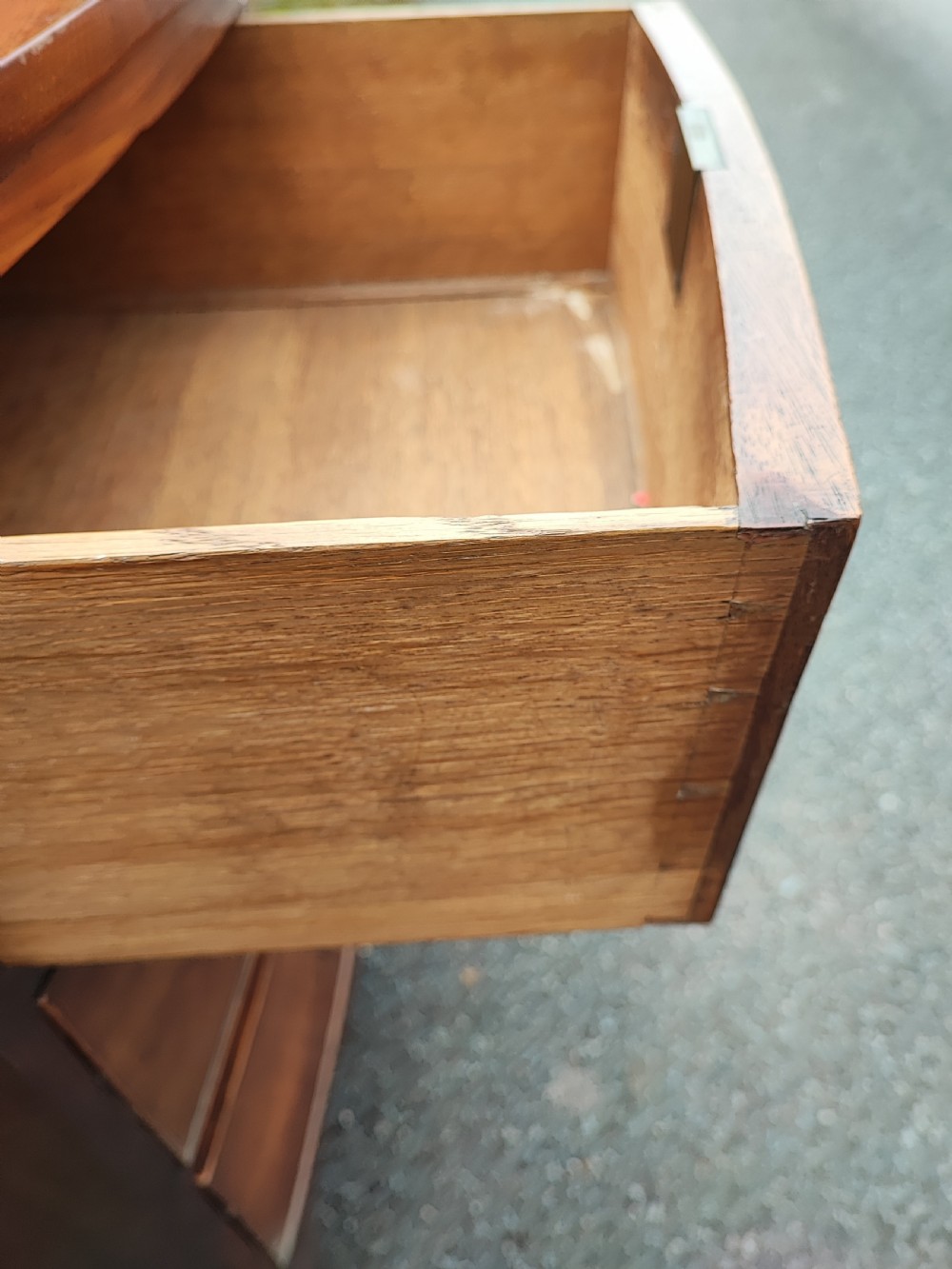 A small Regency mahogany bowfront chest of drawers. View II