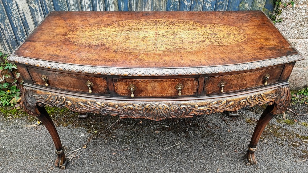 A superb Queen Anne style walnut marquetry carved and gilded hall table or side table.