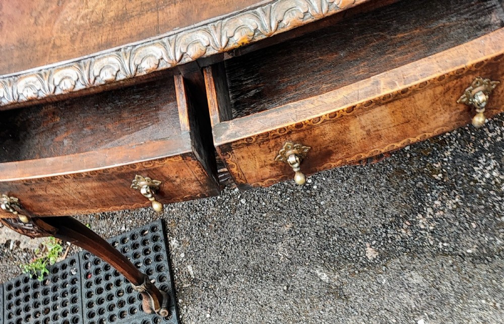 A superb Queen Anne style walnut marquetry carved and gilded hall table or side table. View V