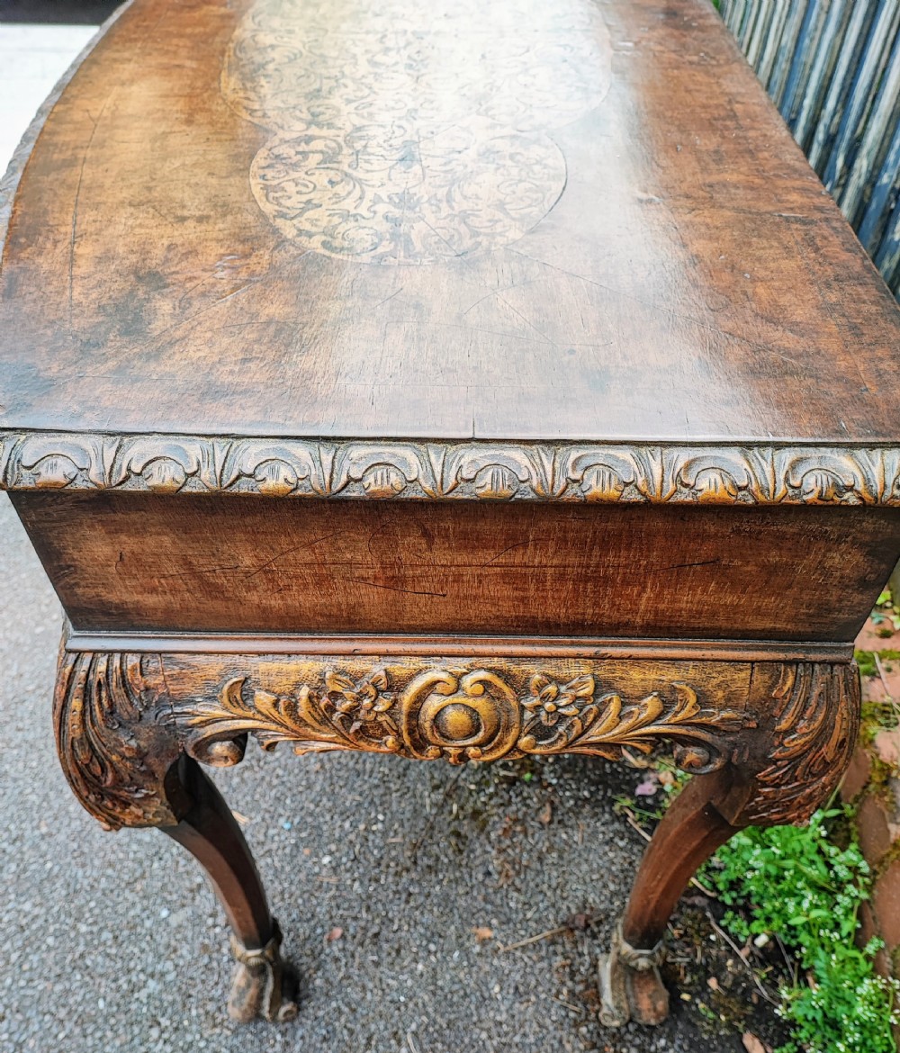 A superb Queen Anne style walnut marquetry carved and gilded hall table or side table. View VI