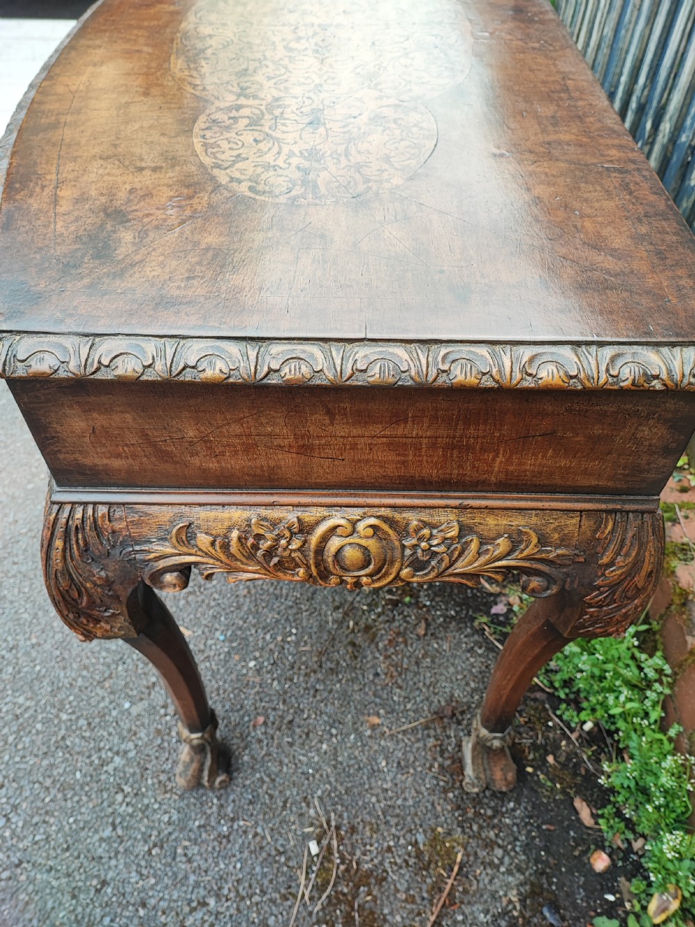 A superb Queen Anne style walnut marquetry carved and gilded hall table or side table. View IX