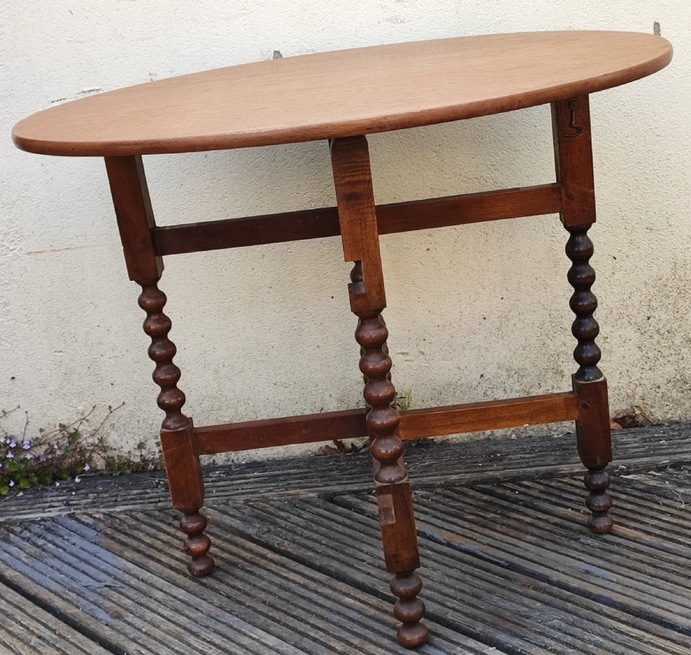 Antique walnut bobbin coaching table. View III