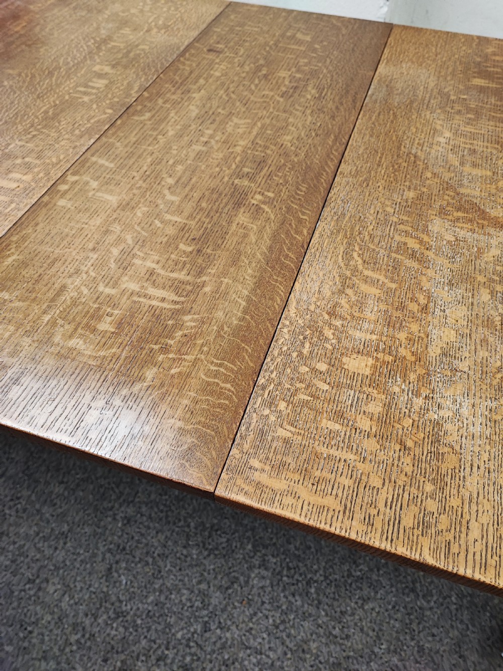 Antique golden oak 2 leaf extending dining table. View VIII