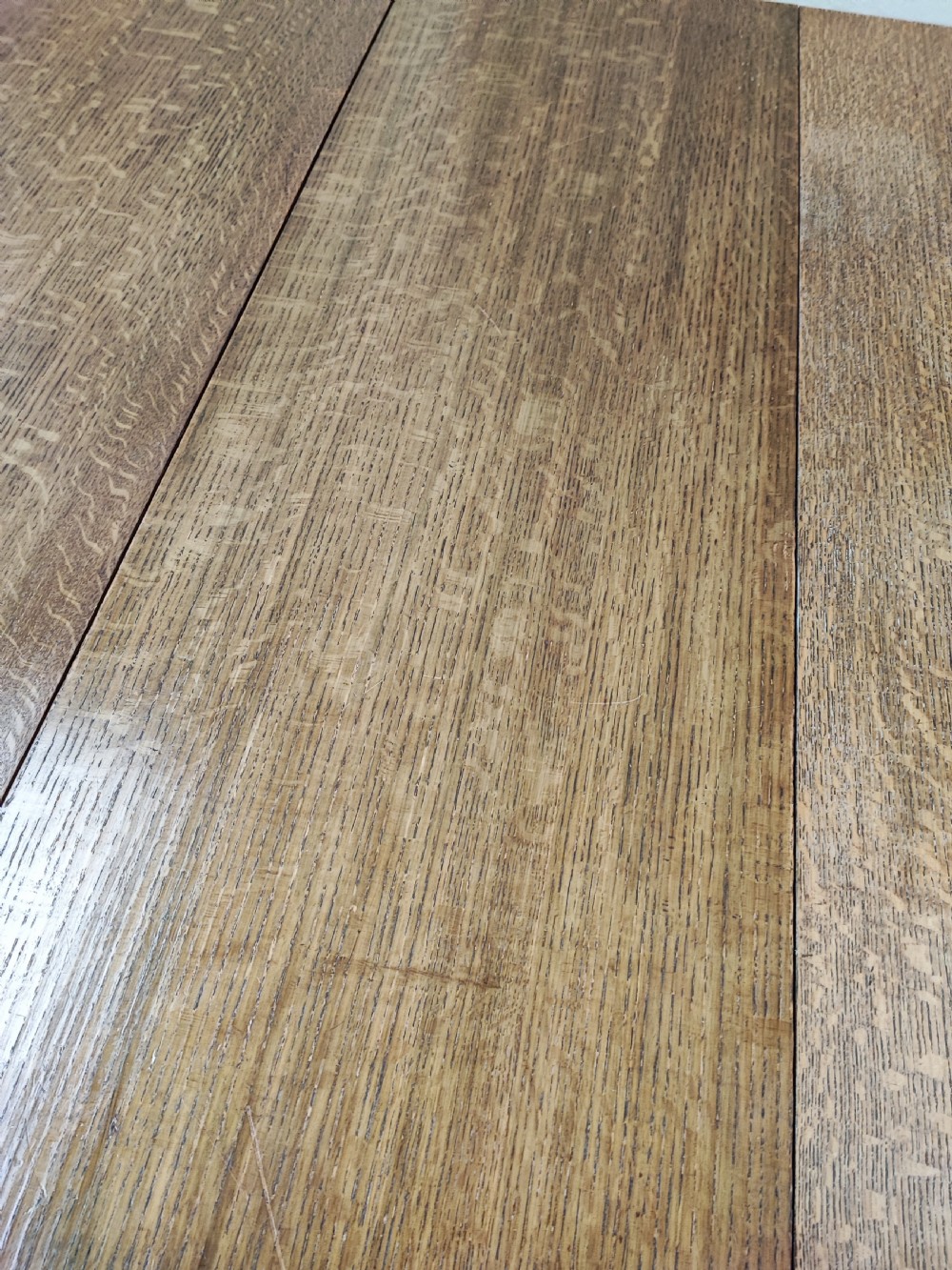 Antique golden oak 2 leaf extending dining table. View XII
