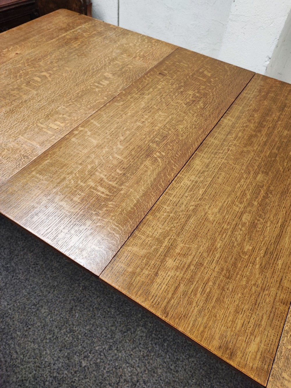 Antique golden oak 2 leaf extending dining table. View XIII