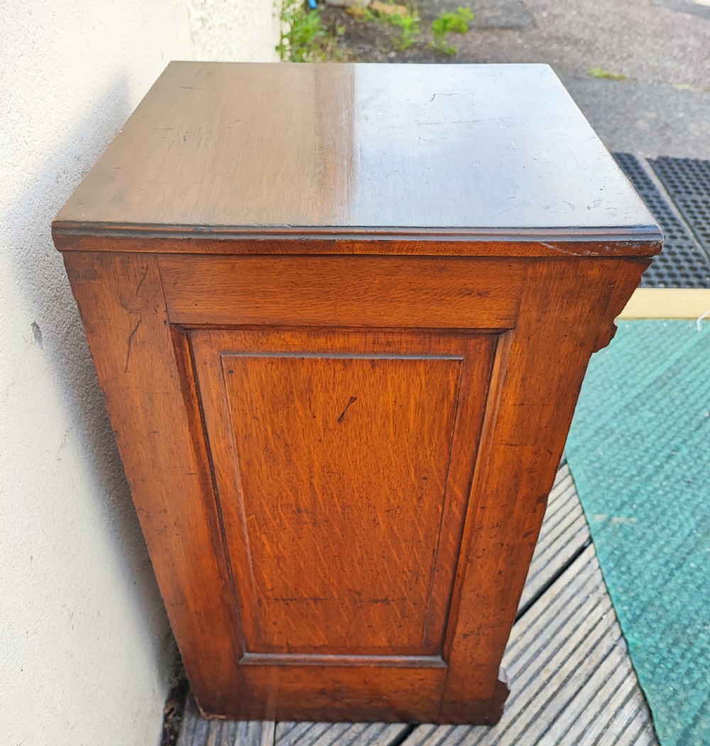 Antique small oak filing chest.  View III