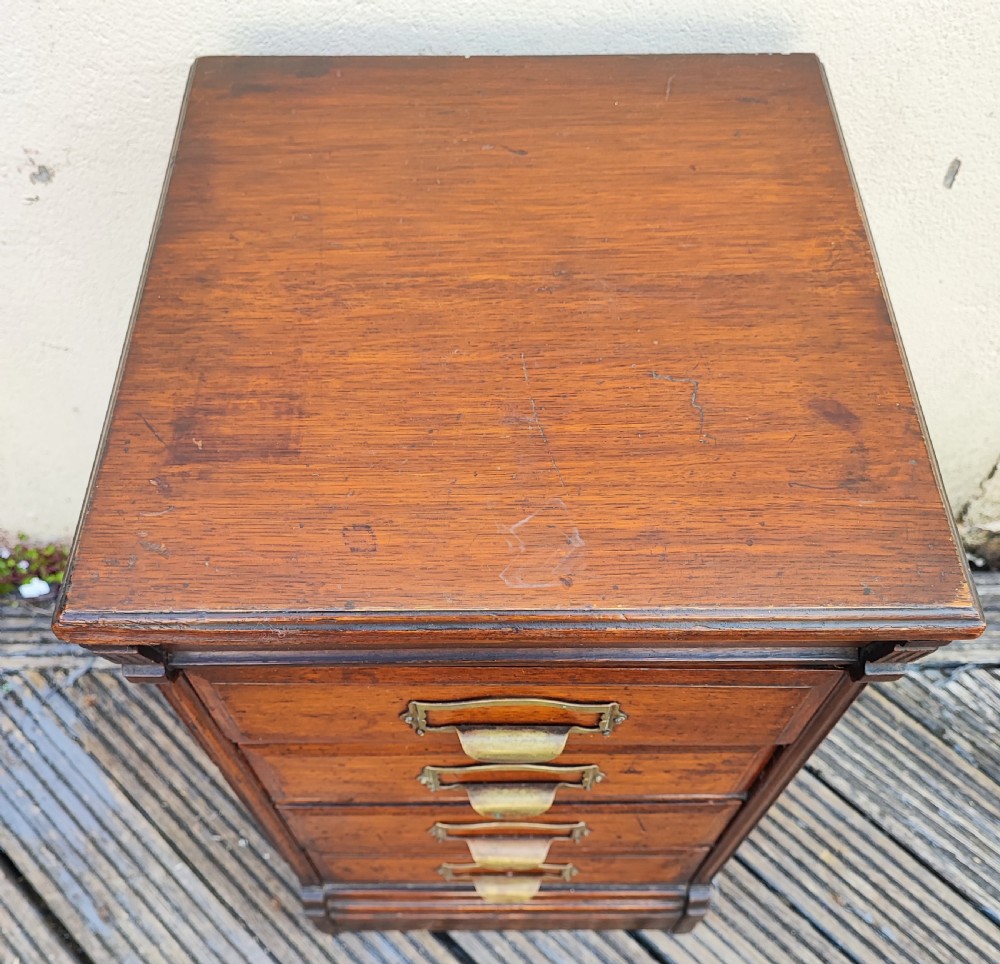 Antique small oak filing chest.  View VII