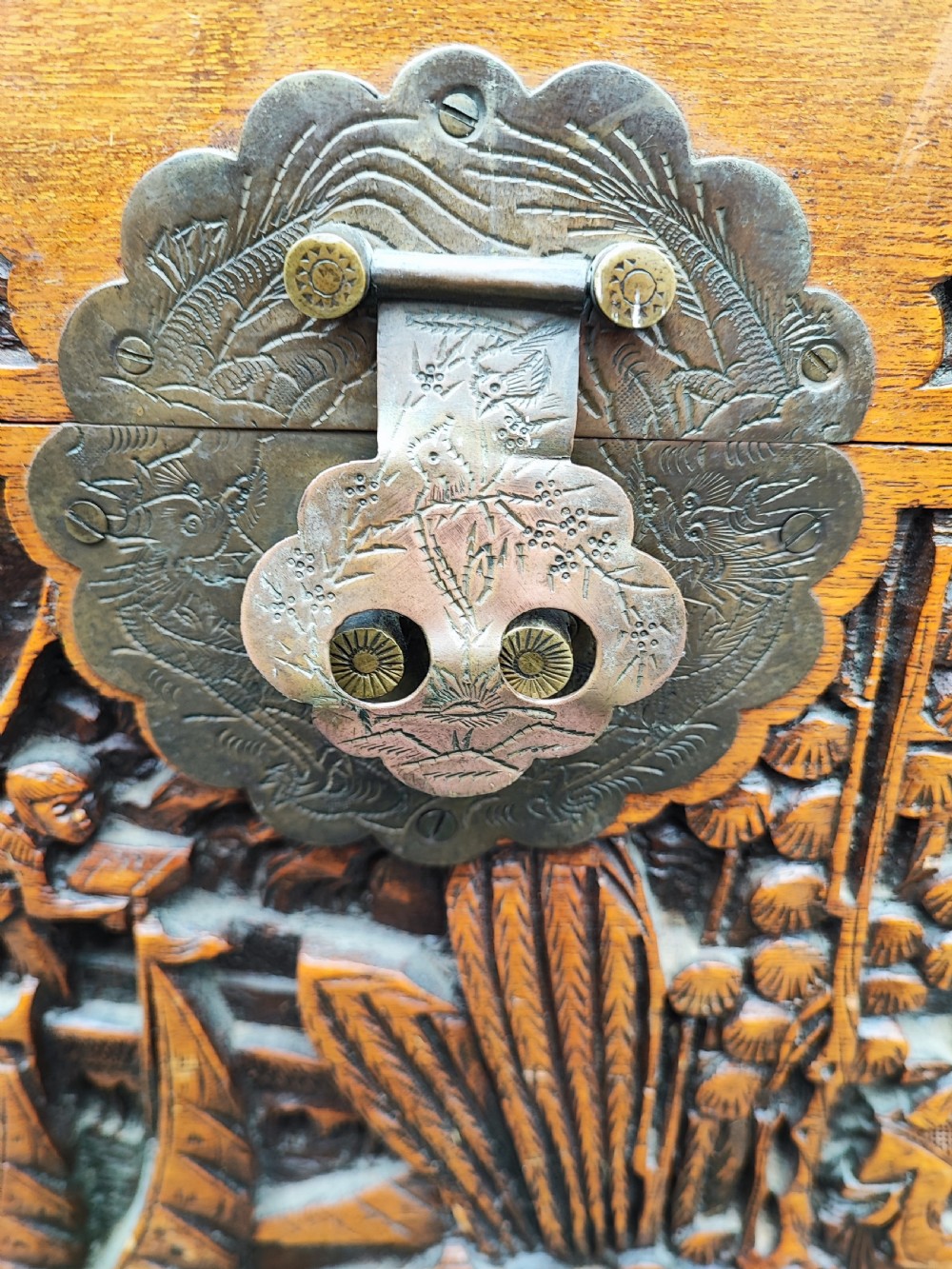 Striking antique carved teak and camphor trunk. View VII