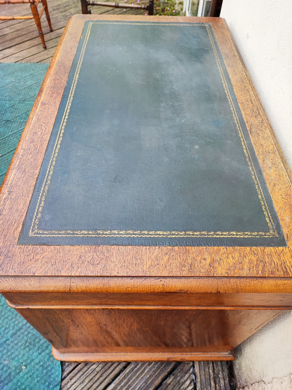 A Victorian oak pedestal desk. View III