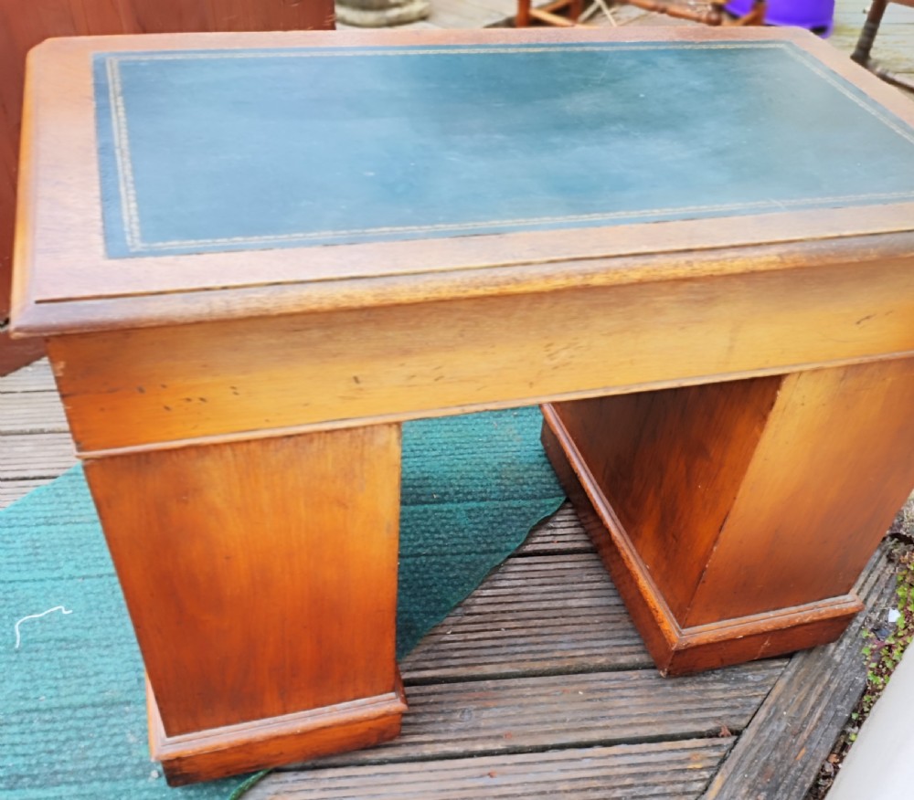 A Victorian oak pedestal desk. View IX