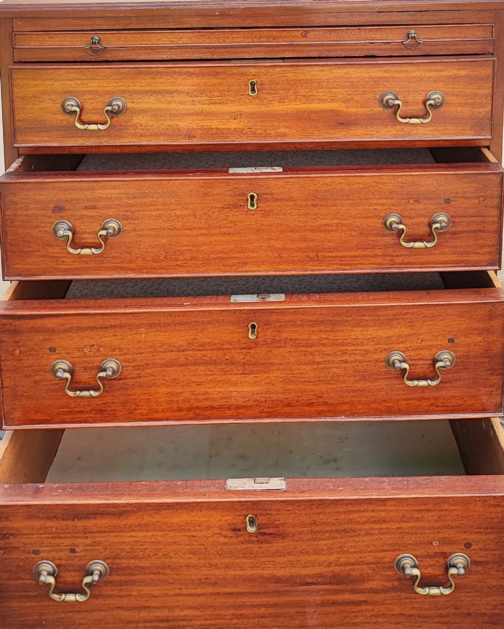 Antique small mahogany chest of drawers. View II
