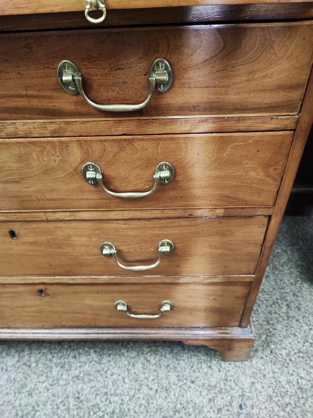 Georgian mahogany chest of drawers with brushing slide. View VI